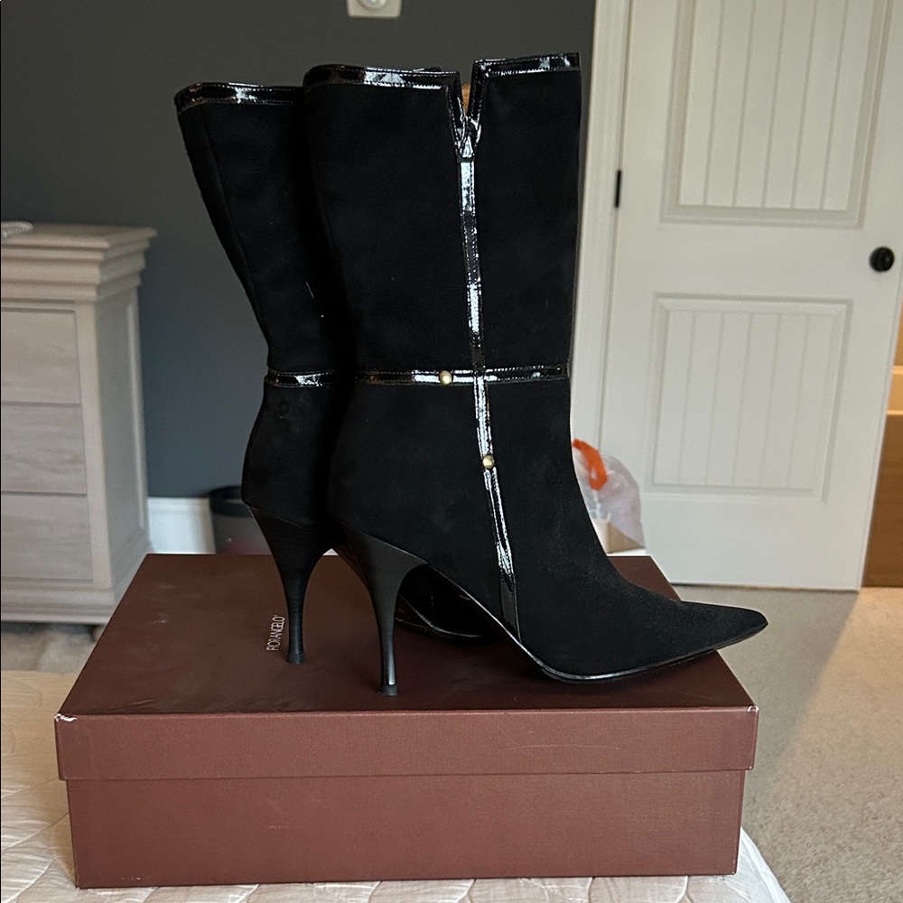 Elegant Black Heeled Boots with Glossy Trim